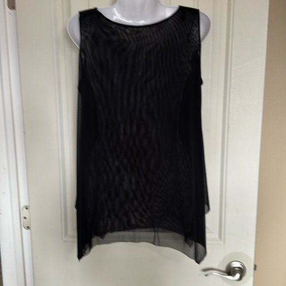 A flowy top with bling saying Do What you Love & Love What you do. 100% Viscose - Picture 2 of 3